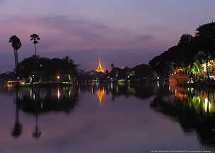 Photo of the grand looking Shwedadon Pagoda, Yangon  with Kan Daw Gyi (Kandawgyi) Lake Garden