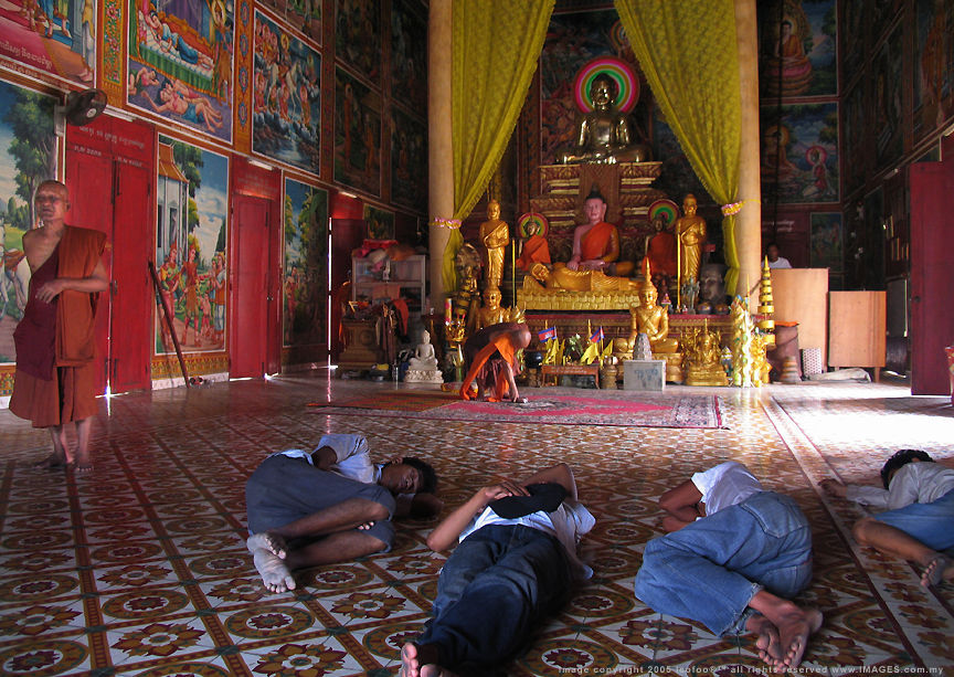 The Homeless inside the main  hall of a Buddhist temple/wat