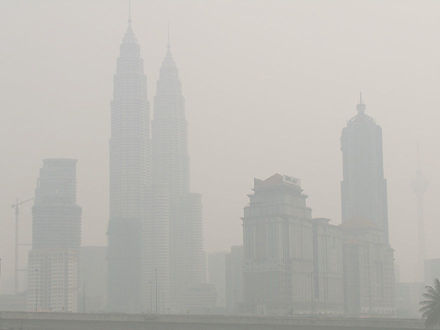 The haze covering the Petronas Twin Towers and  KLCC area
