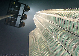 Framing a photo of Petronas Twin Towers and KLCC with the spot light