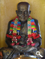 An all bronze Luong Phor Thuat / Thuad image at Wat Chaiyamangalaram (Wat Chai) Thai Buddhist Temple