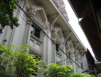 Side building for sorting and distribution of donated items from devottees