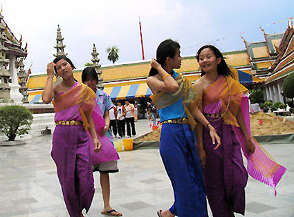 Young Thai beauties with traditional Thai customes at Songkran Day at Wat Suthat