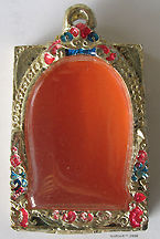 A modern produce of an amulet frame/case  with decorative gems stones