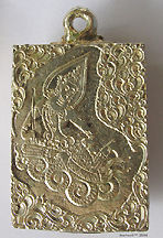 A modern produce of an amulet frame/case  with rear section flowery patterns in silver