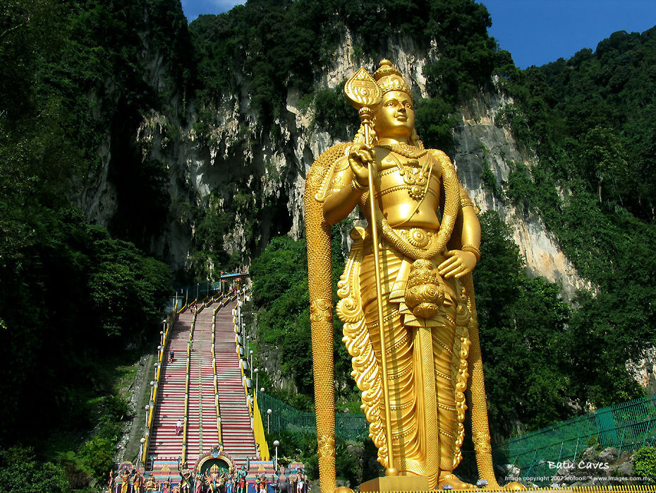 The huge 42.7m tall statue (Lord Murugan) at the front of the Batu Cave Hindu Temple, the most sacred religious location for Hindu in Malaysia. 