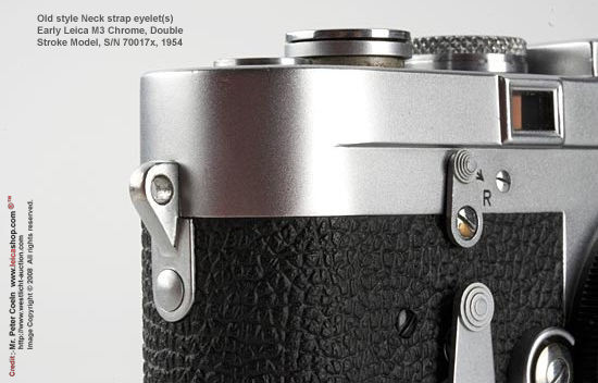 Old design of angled, triangular shape neckstrap eyelets on a Leica M3 early bodies