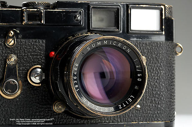 The matching Summicron 1:2 f=50mm standard lens in a rare and highly collectible Leica M3 black body model in single stroke, 1962