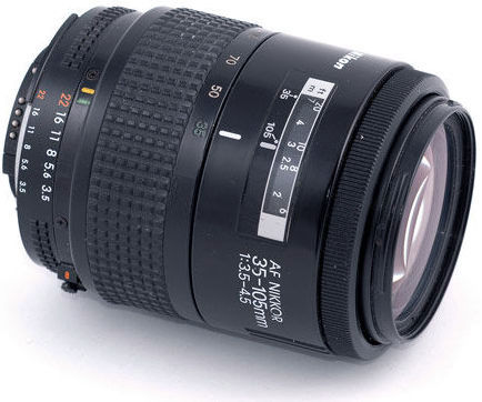 Side view of an early AF Zoom Nikkor 35-105mm f/3.5~4.5s wideangle-telephoto Zoom lens 