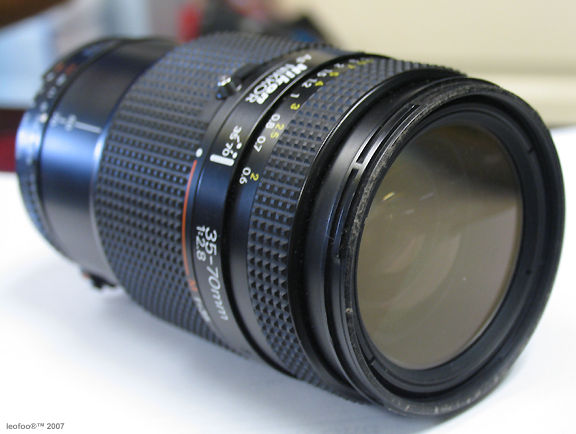 Front and side view of a AF Nikkor zoom 35-70mm f/2.8 lens