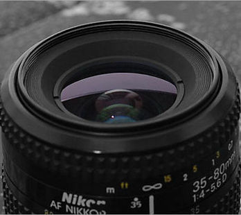 (AF) Nikkor 35-80mm f/4~5.6D zoom lens front lens element