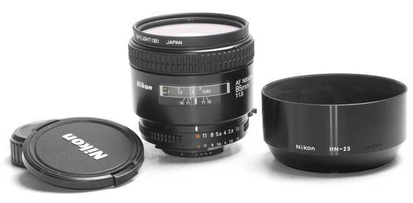 Nikon Nikkor 85mm f/1.8S early version with lens cap and metal lens hood HN-23