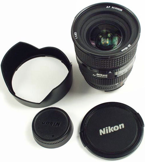 Standard and optional accessories for Nikon Zoom Nikkor 20-35mm f/2.8D IF lens cap, rear cap, bayonet lens hood HB-8
