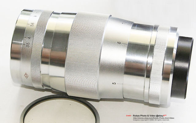 Sectional view of an all chrome Canon 135mm f/3.5 telephoto lens