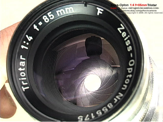 Front lens reflection of coating on a Zeiss-Opton Triotar 1:4 f=85mm (85mm f/4.0) telephoto lens