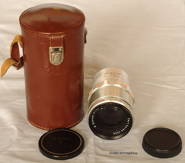 Carl Zeiss Jena Sonnar 4/13.5cm, for Contax I, black/nickel, export version with distance scales marked in feet, rear cap. 
Approx. Year: 1934/5 
