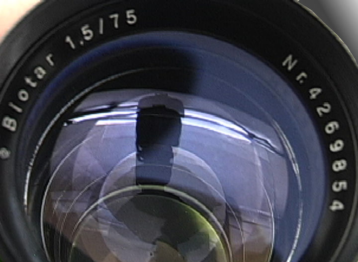 Rear section of the chrome lens barrel of a Zeiss-Opton Triotar 1:4 f=85mm (85mm f/4.0) telephoto lens