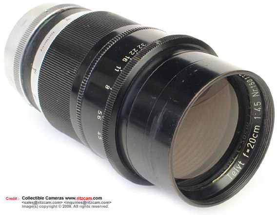 Side view of Leica f=20cm 1:4.5 (200mm f/4.5 Telyt telephoto lens (Post War version) for Visoflex (Reflex Housing)
Distance scales marked in feet 