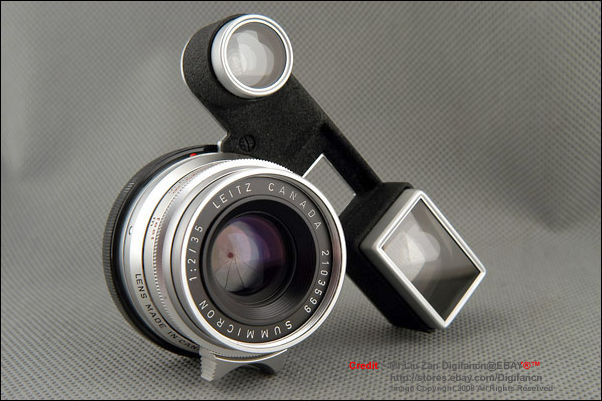 Leitz Canada Summicron 35mm f/2.0 wideangle lens  in chrome with attachment which fits LEICA M3