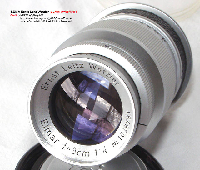 Front view with lens element and lens coating reflection  of  a 1952 Leica SM rangefinder (RF) chrome version of Ernst Leitz Wetzlar f=9cm 1:4.0 Elmar (a Nettax picture)