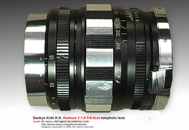 All metal, rigid feel and look in a side lens tube view of Sankyo Koki K..K. Komura 1:1.8 f=8.5cm (85mm f/1.8) Telephoto lens