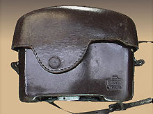 A rare black leather camera case for Nikon SP rangefinder cameras with Nikkor 1:1.1 f=5cm