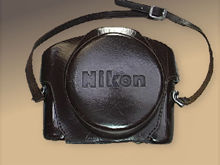 A rare black leather camera case for Nikon SP rangefinder cameras with Nikkor-S 1:1.1 f=5cm
