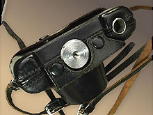 A rare black leather camera case for Nikon SP rangefinder cameras with tightening screw model