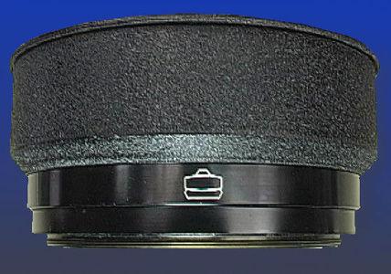 Side view of a dedicated lens hood with crinkle finish for Nikkor-H.C 18cm 1:2.5 short mount long telephoto lens requires the use of Nikon Reflex Housing