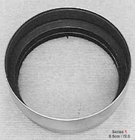 An earliest version of chrome metal lens hood for Nikkor-P 8.5cm f/2.0 telephoto lens front view