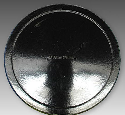 A rear section of MIOJ (Made in Occipied Japan)  old style lettering on the  rear cap during the Nikon rangefinder days