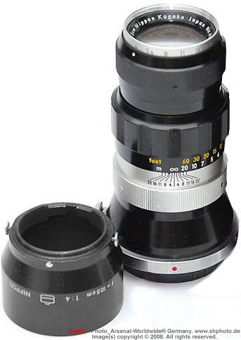 Vertical view of of overll dimension on a rangefinder (RF) version of the Nikkor-T 1:4 f=10.5cm (Nikkor-T 105mm f/4.0) telephoto lens for Nikon rangefinder system with the original lens hood at the side