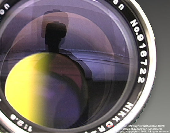 A lovely photo captured by Kelvin Li on the reflection of the lens coating on Nikkor-P.C 105mm f/2.5 Rangefinder version