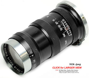 high res view of an all black, black paint  version of a Nikon RF Nikkor-Q.C 1:3.5 f=13.5cm telephoto lens for rangefinder Nikon cameras