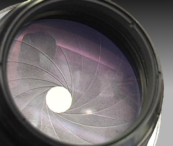 front lens element of a Bellow Nikkor 135mm f/4 lens head for RF Nikon cameras 