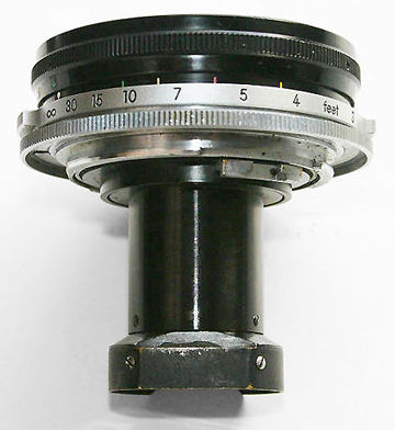 The side vertical view of the elongated lens tube of the Nikkor-O Reflex F-mount 2.1cm f/4.0 (21mm f/4.0) by  Rokas Photo & Video