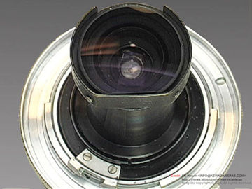 The exposed lens element at the rear section of the S-MOUNT VERSION 21mm f/4.0 Nikkor-O