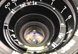 A deeply recessed front section of the S-mount W-Nikkor 2.5 Cm lens