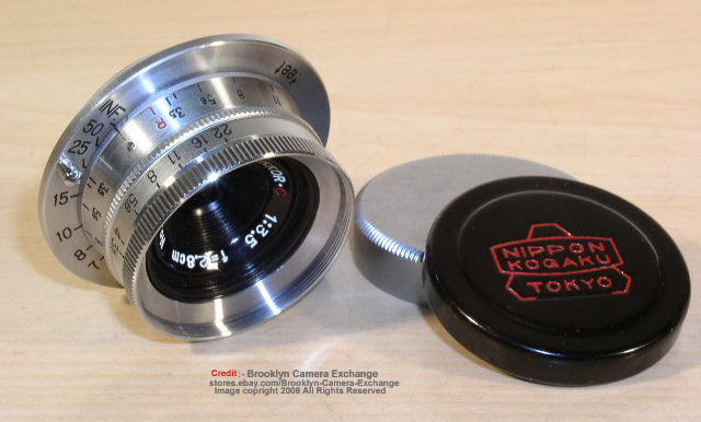 Chrome on brass version of the Nikon W-Nikkor-C 1:3.5 f=2.8cm wideangle lens in Leica screw mount (SM) with original lens cap