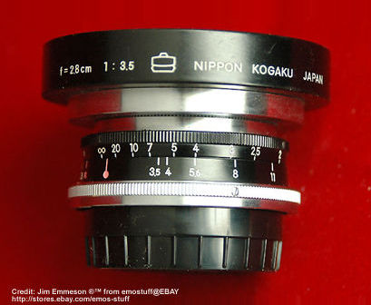 A black version of the W.Nikkor-C 2.8cm f/3.5 (28mm f/3.5) RF rangefinder wideangle lens with dedicated lens hood attached.