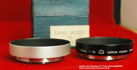 A Black and chrome version of the lens hood for  Nikon W-Nikkor-C 1:3.5 f=2.8cm (28mm f/3.5) wideangle lens in Nikon Bayonet S-Mount  