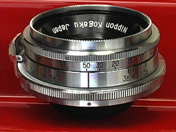 Nikon W-Nikkor-C 1:3.5 f=2.8cm (28mm f/3.5) wideangle lens in Nikon Bayonet S-Mount all chrome on brass version