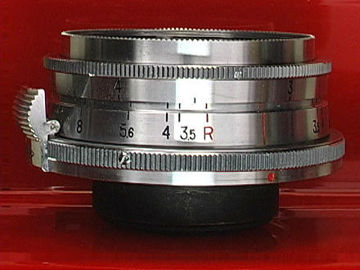 Side section view of a typical old, Nikon W-Nikkor-C 1:3.5 f=2.8cm (28mm f/3.5) wideangle lens in Nikon Bayonet S-Mount all chrome on brass version