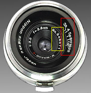 The front view with various lens data and depth of field scales in compressed scales format on a Nikon W-Nikkor-C 1:3.5 f=2.8cm (28mm f/3.5) wideangle lens in Nikon Bayonet S-Mount all chrome on brass version