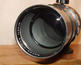 Front section lens element on the old, RF Nikkor telephoto
