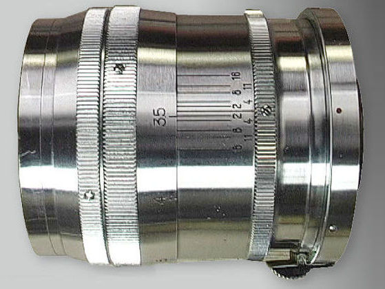 The chrome lens barrel of the early model of Nikkor-P 1:2 f=8.5cm telephoto lens for Nikon rangefinder camera