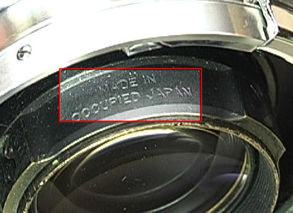 Made in Occupised Japan symbol engraving on the  Nikkor-P 1:2 f=8.5cm telephoto lens for Nikon rangefinder cameras