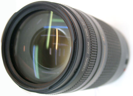 Canon EF 75-300mm f/4.5~5.6 tele-zoom lense Loading ......