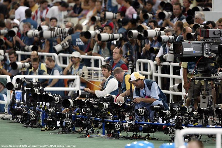 Men 100m final at the finishing line at Athen Olympic, pictured by Vincent Thian, AP