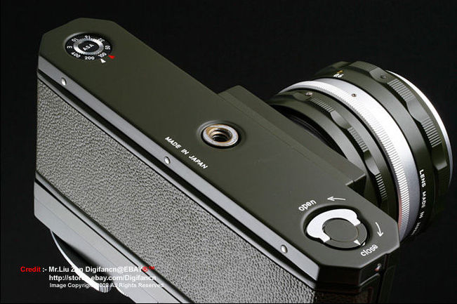 Base plate with tripod collar socket of Nikon F Olive colored Body 